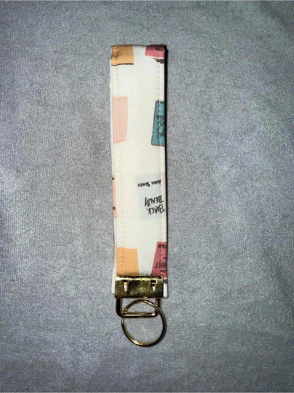 Book Print Wristlet Keychain - Cream with Pastel Blocks